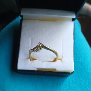 Elegant Gold Ring with Diamond Accents